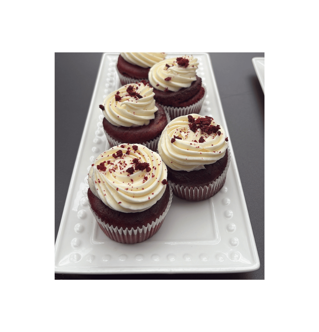 Red velvet cupcakes with cream cheese frosting and red velvet crumble